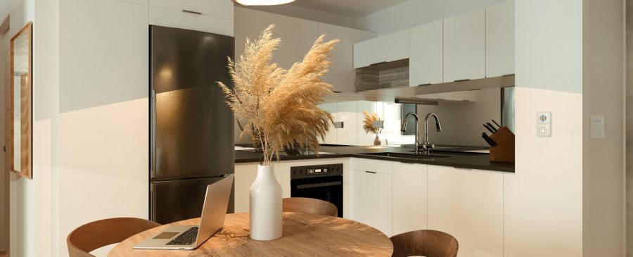 Cozinha moderna de apartamento compacto com mesa de jantar e decoração minimalista.